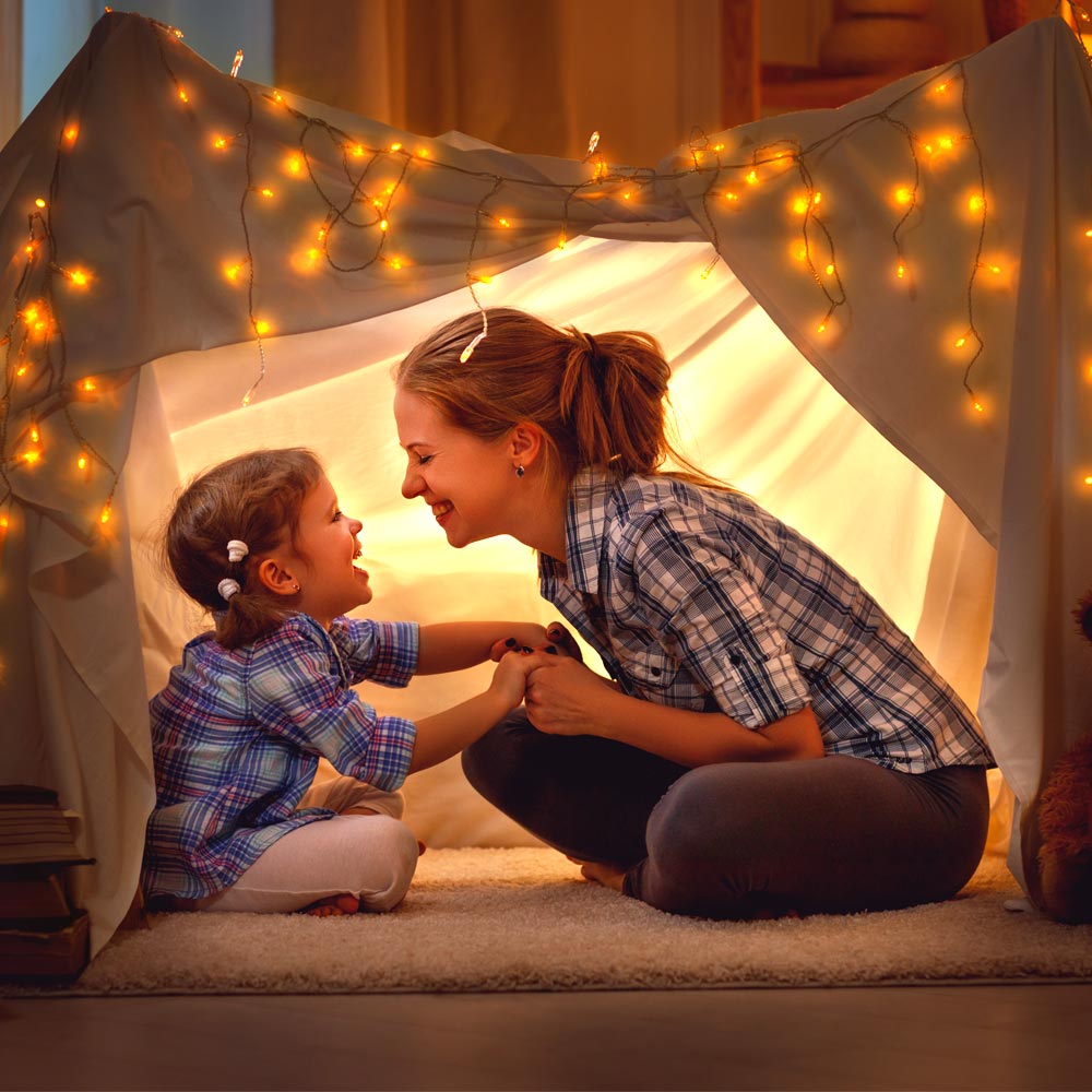 Mom and daughter playing